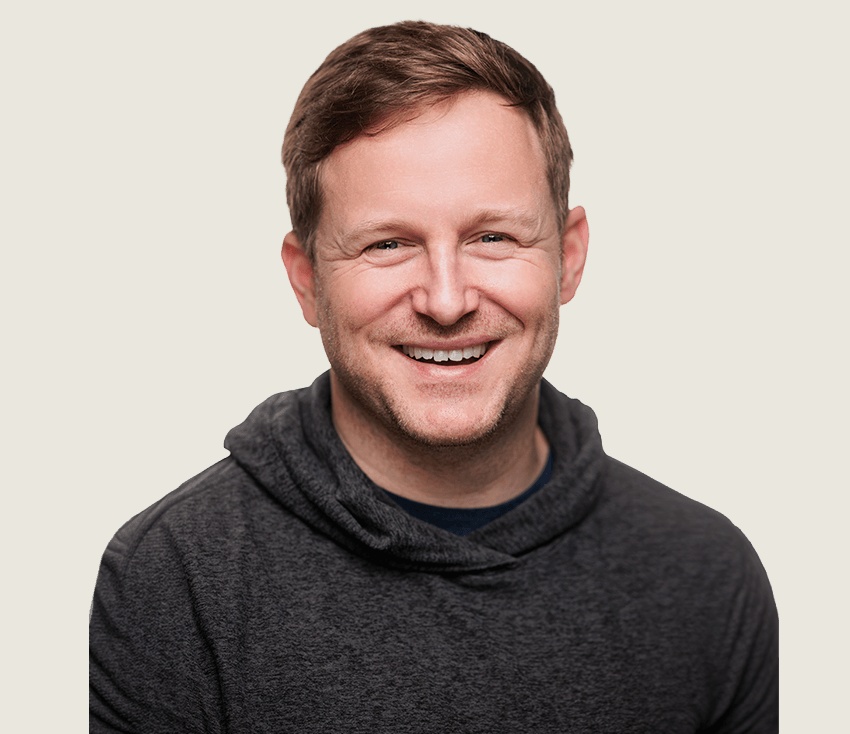 Catalant co-founder and CEO Pat Petitti smiling in a dark sweater