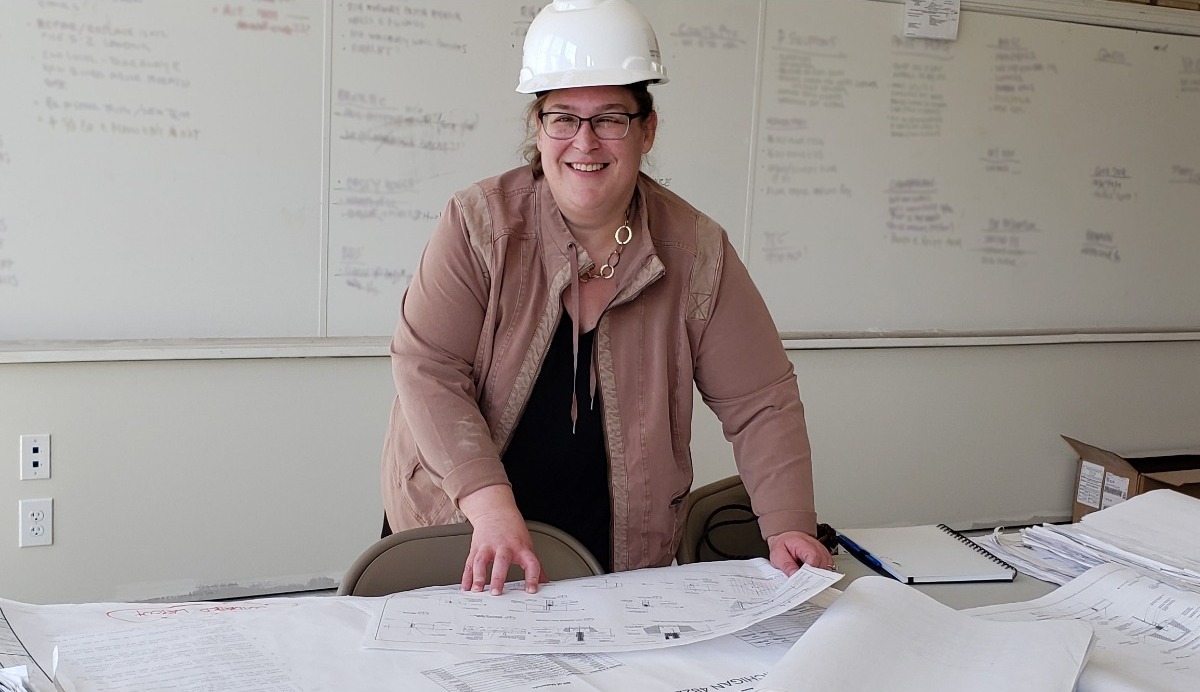 Catalyst Media Factory founder Jennifer Foster wearing a hard hat at a project site