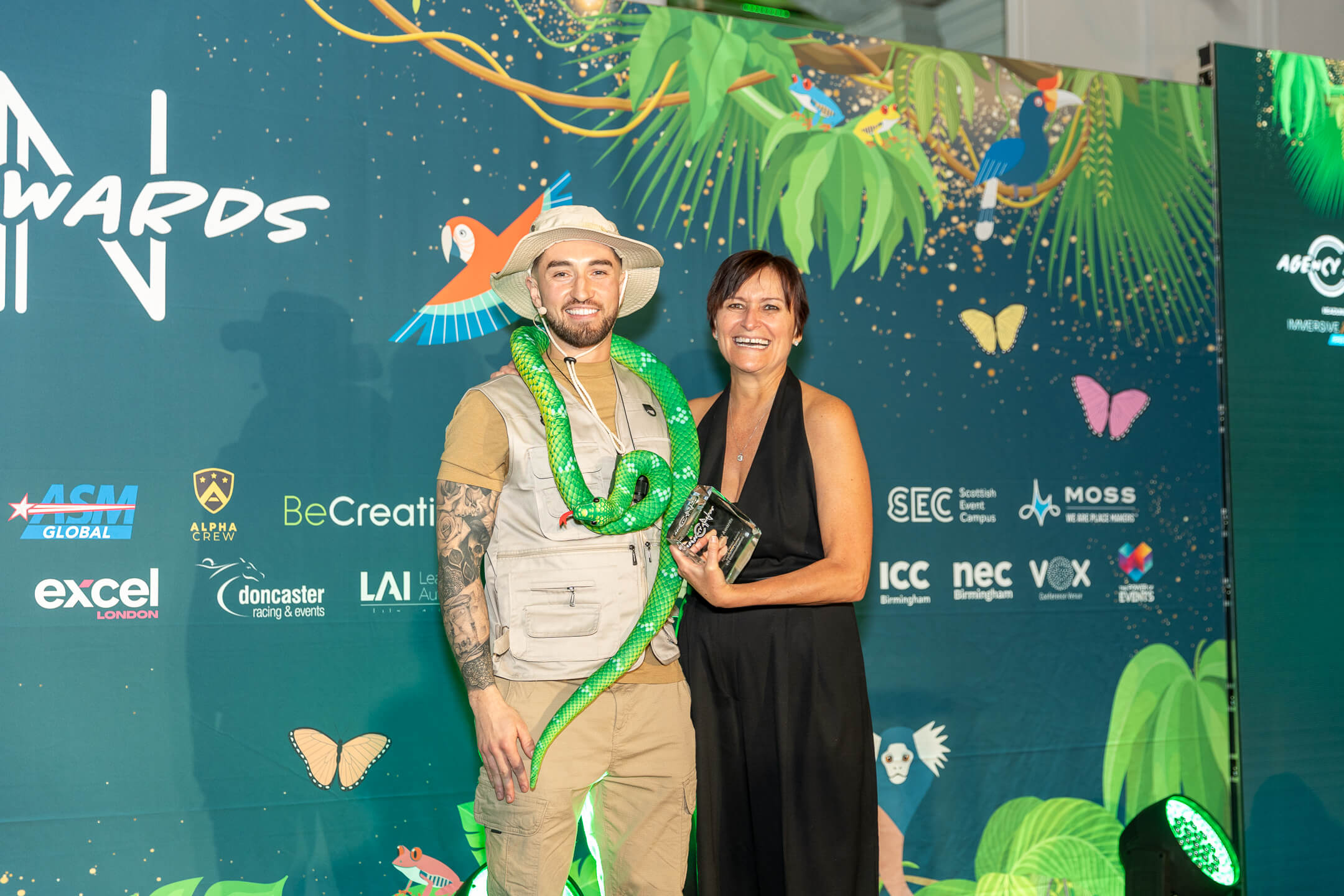 Catherine Turner smiling and holding her Agency Pioneer Award at the 2025 CN Agency Awards