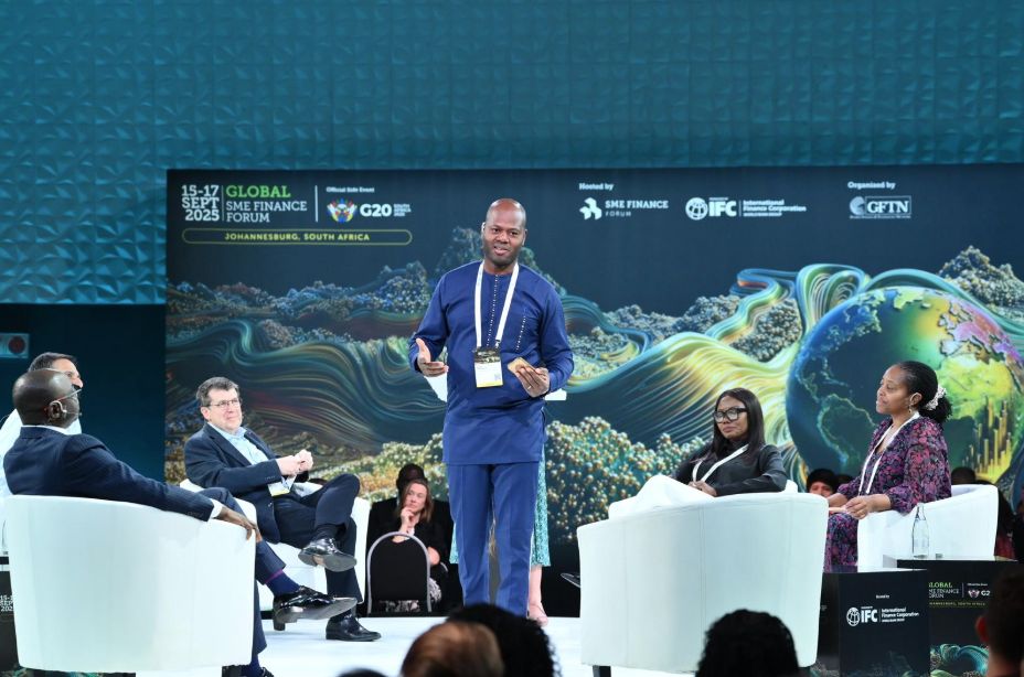 Azer Songnaba speaking on stage at the Global SME Finance Forum in Johannesburg