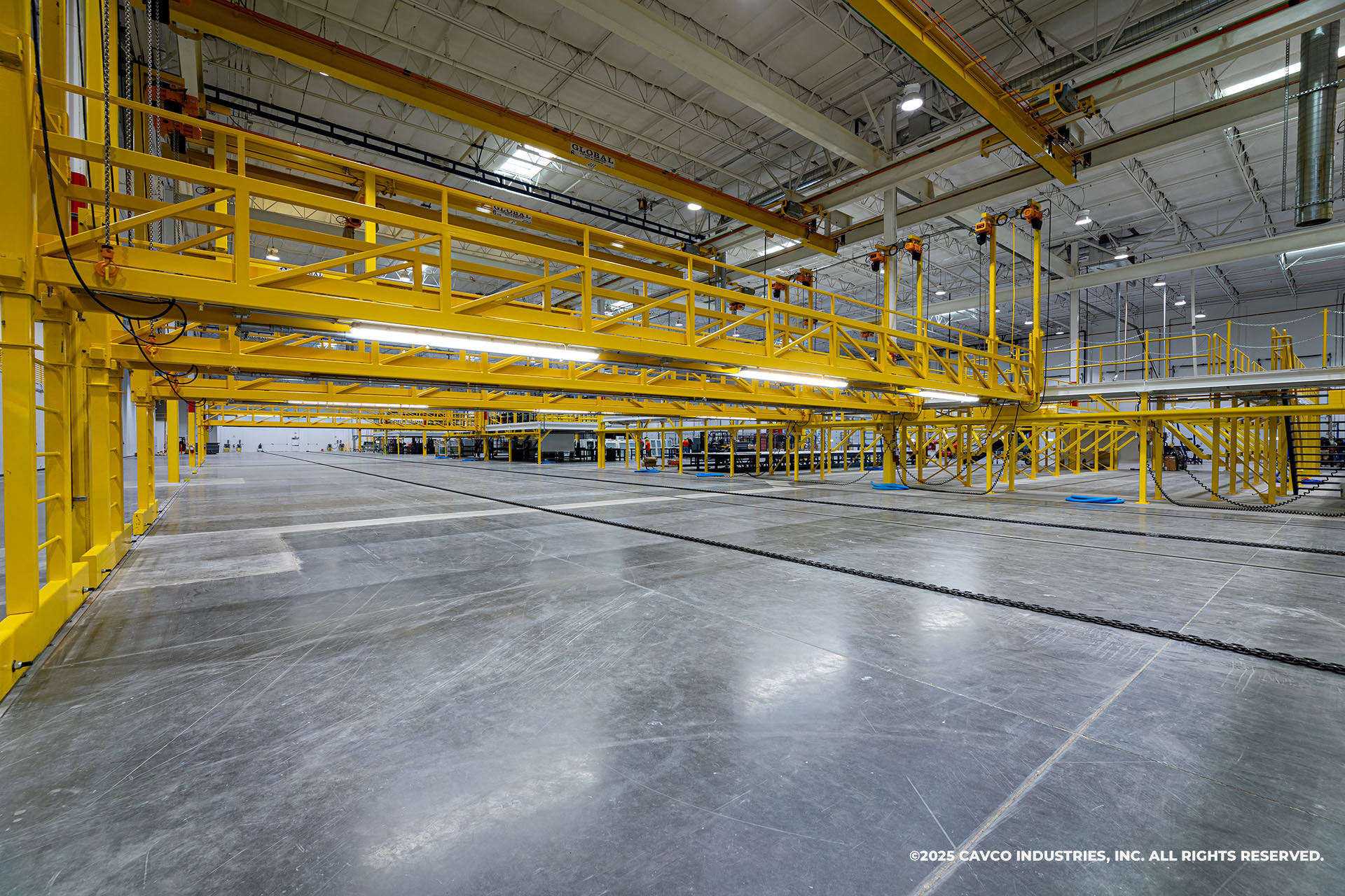 Interior of Cavco’s Glendale production facility with homes under construction