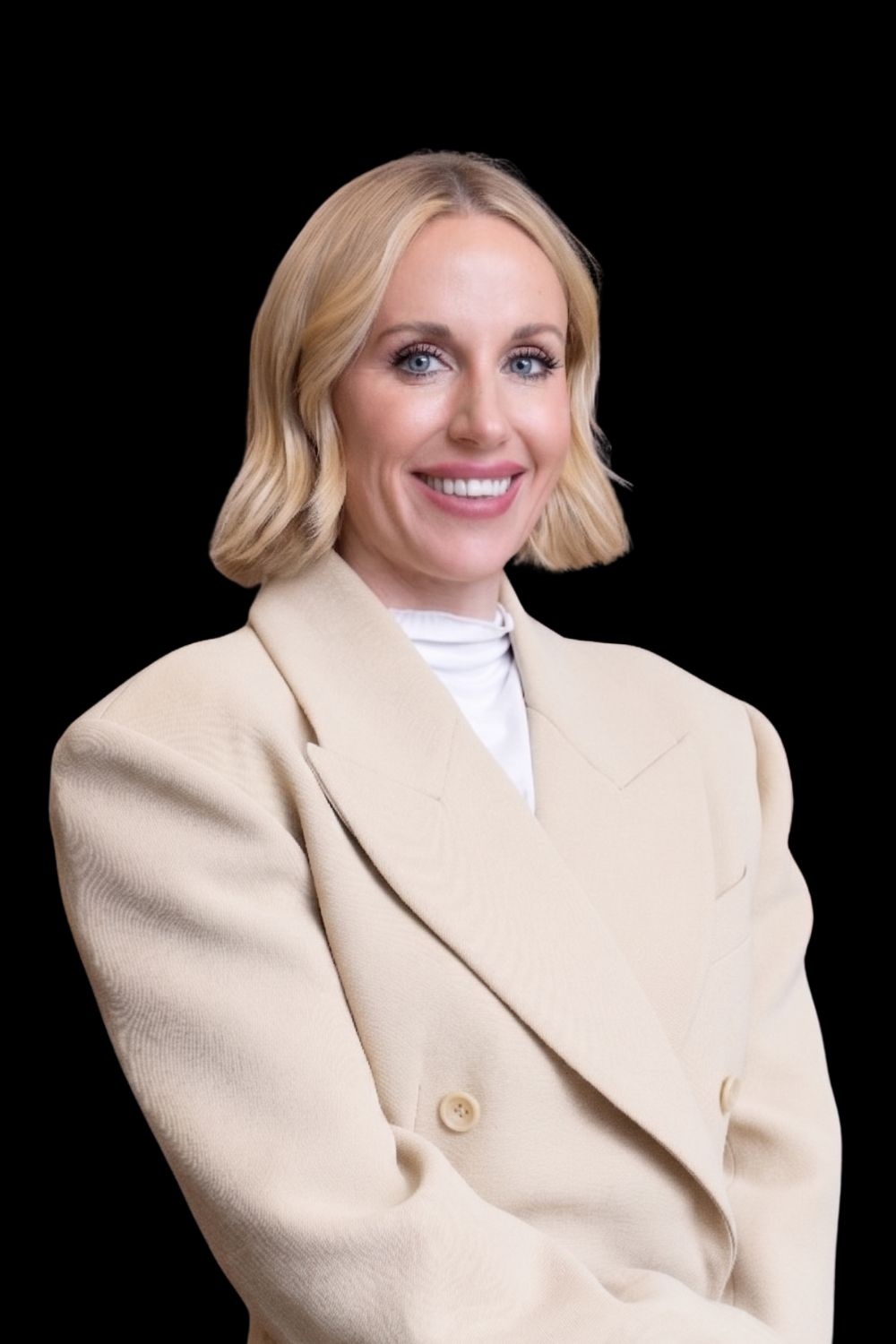 Caylent CEO Valerie Henderson wearing a cream jacket