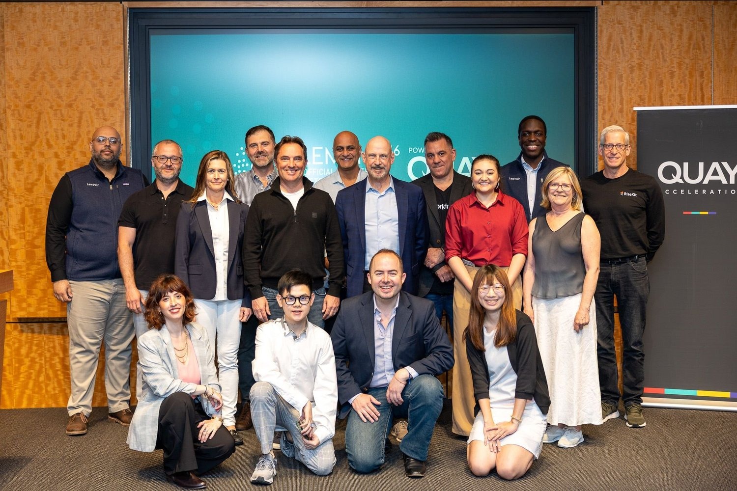 Element 46 founders and program participants posing together at the Spring 2025 Demo Day under QUAY