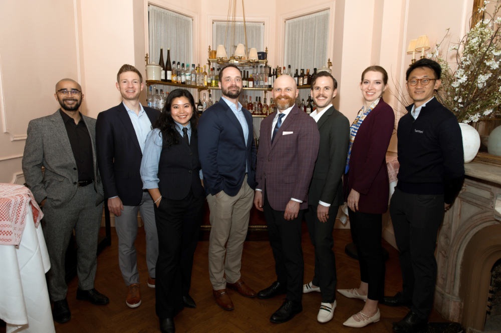 Members of the Centari team gathered at an event