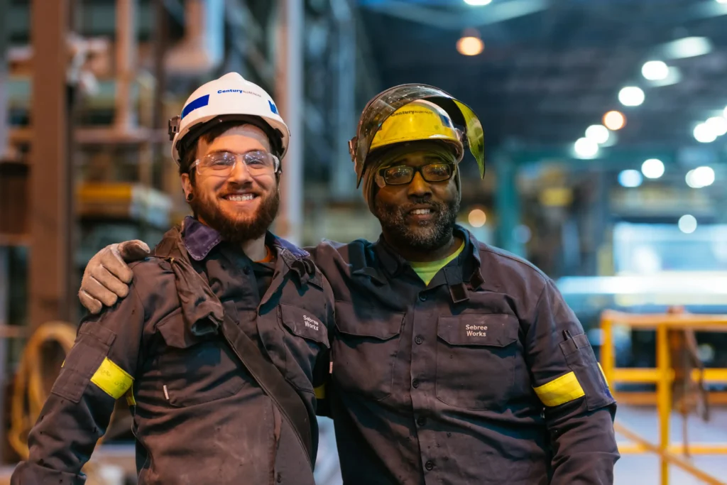 Two Century Aluminum colleagues in protective equipment at Sebree Works