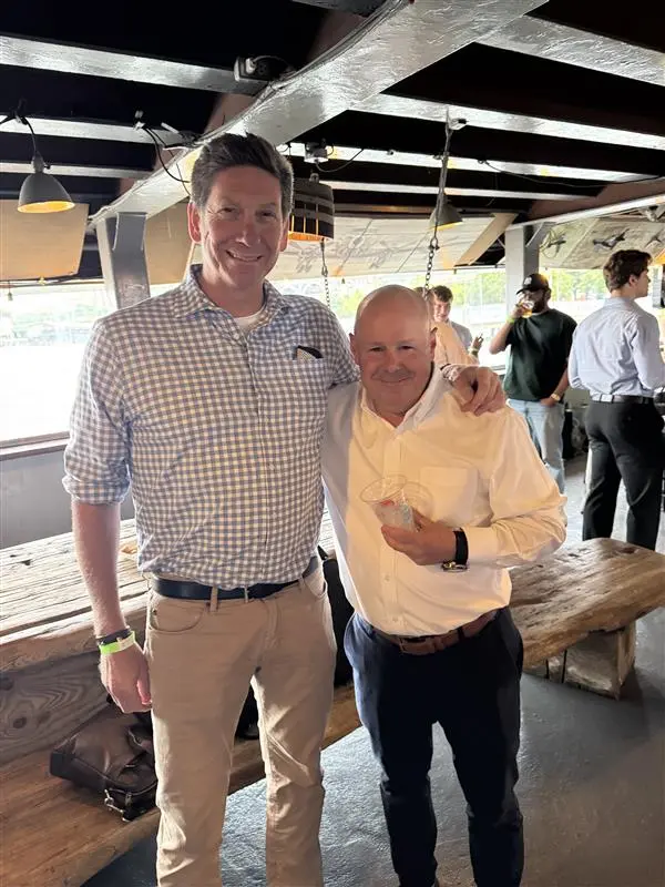 CFG CEO Andrew Coon and President Bill Gallagher together at a company gathering