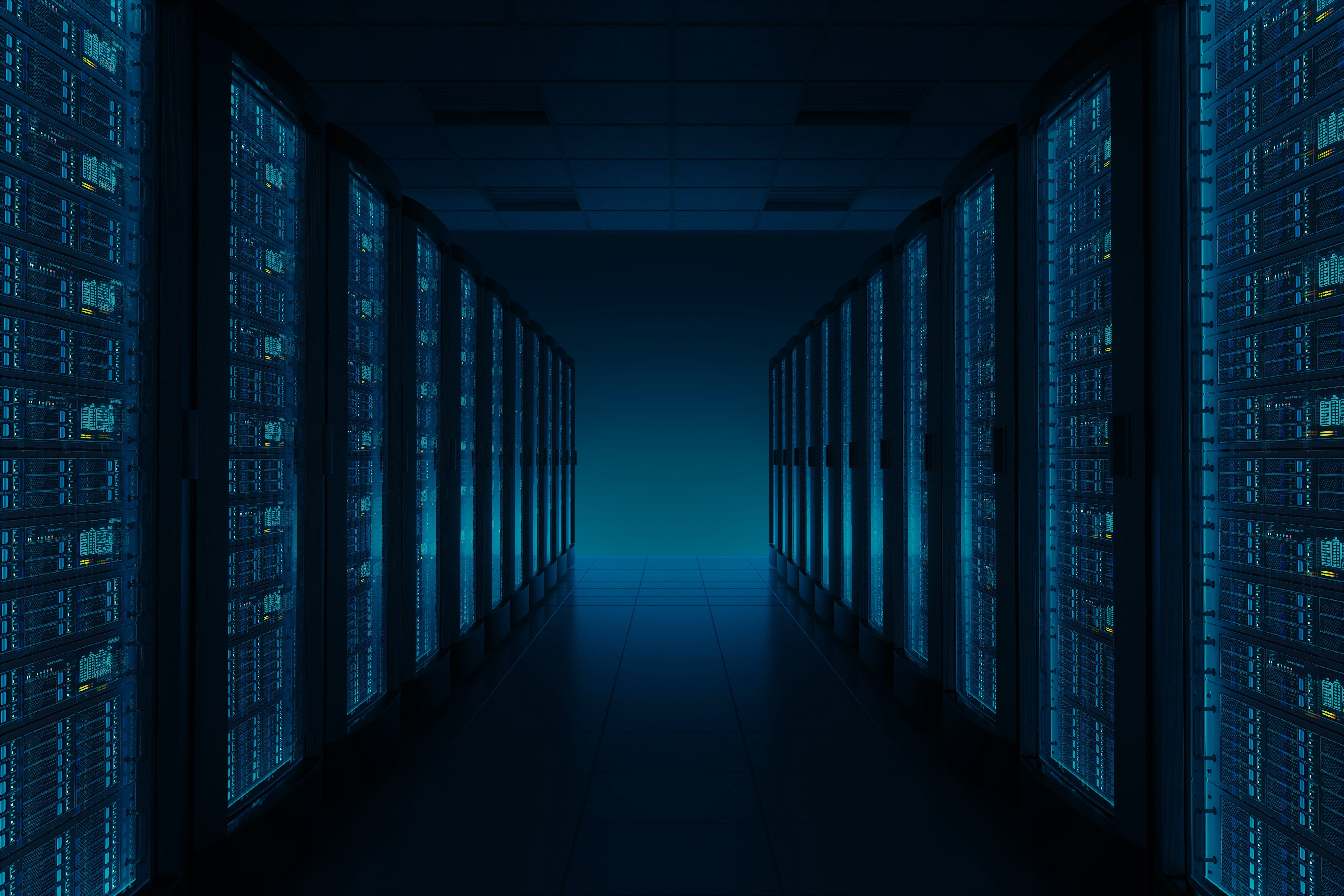 Darkened data-center photograph showing rows of server cabinets