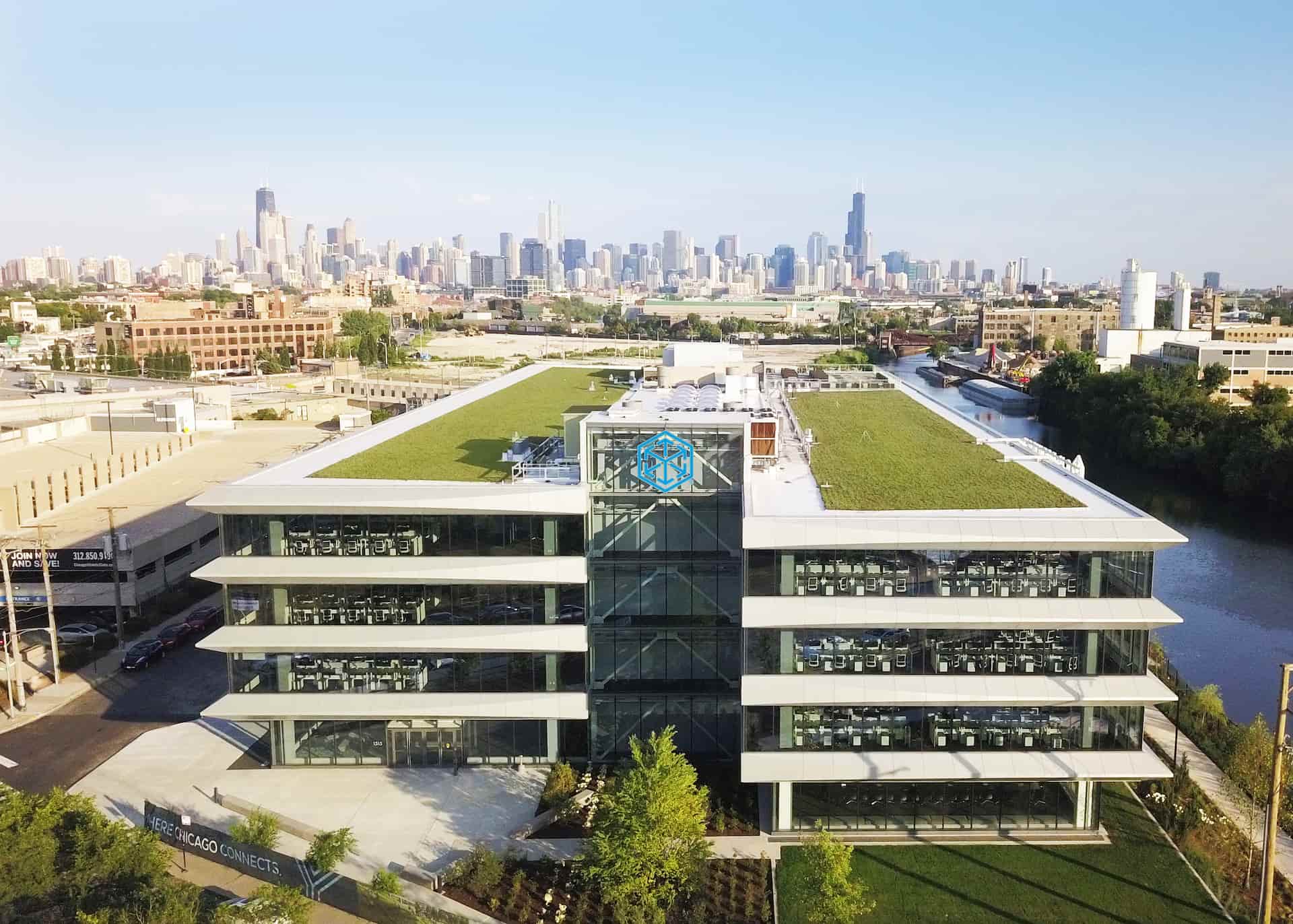 C.H. Robinson’s Chicago office beside the river, with the city skyline behind it