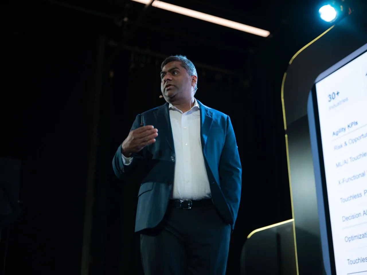 Chakri Gottemukkala speaking on stage at aim10x Americas 2025