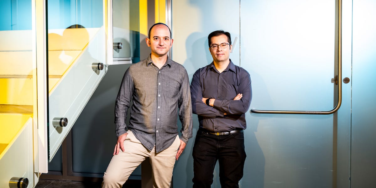 Character.AI co-founders Noam Shazeer and Daniel De Freitas in an office
