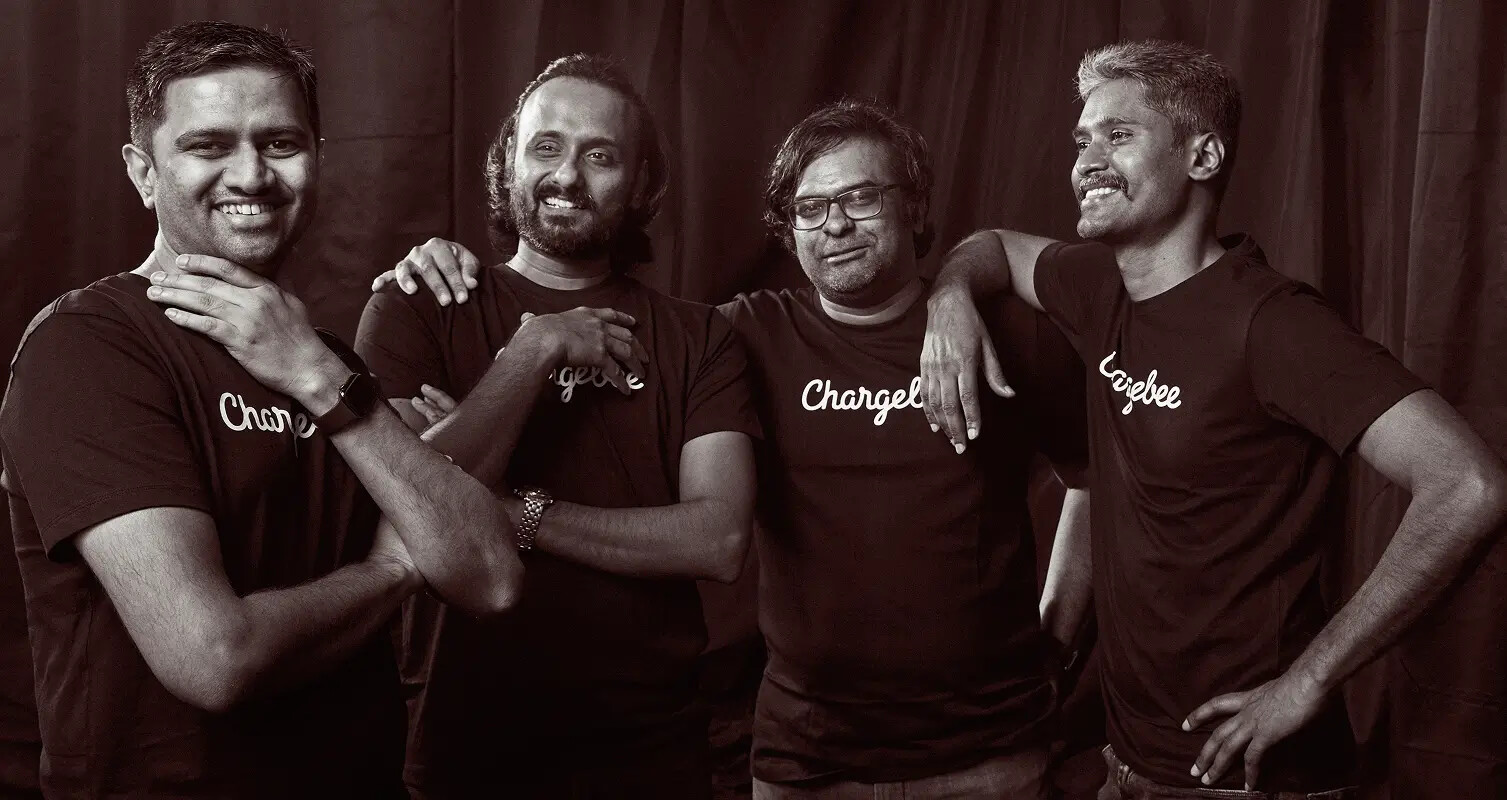 Chargebee's four founders standing together in Chargebee shirts