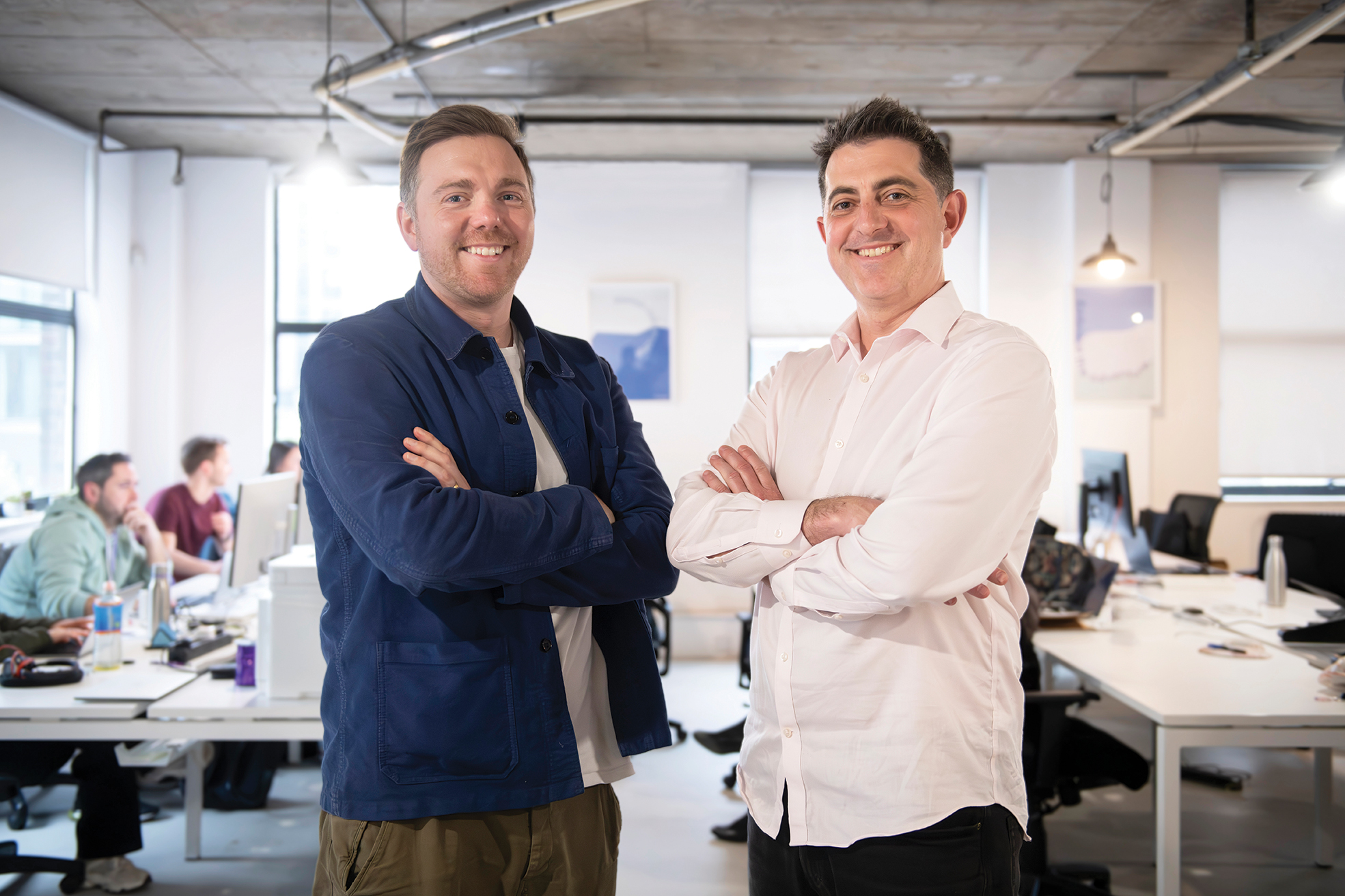 Charles Armitage, left, and Florence co-founder Dan Blake standing together in their office