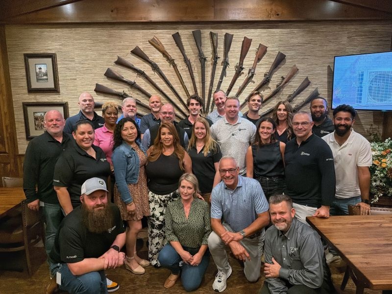 A group from the National Trench Safety and Moab customer celebration poses together