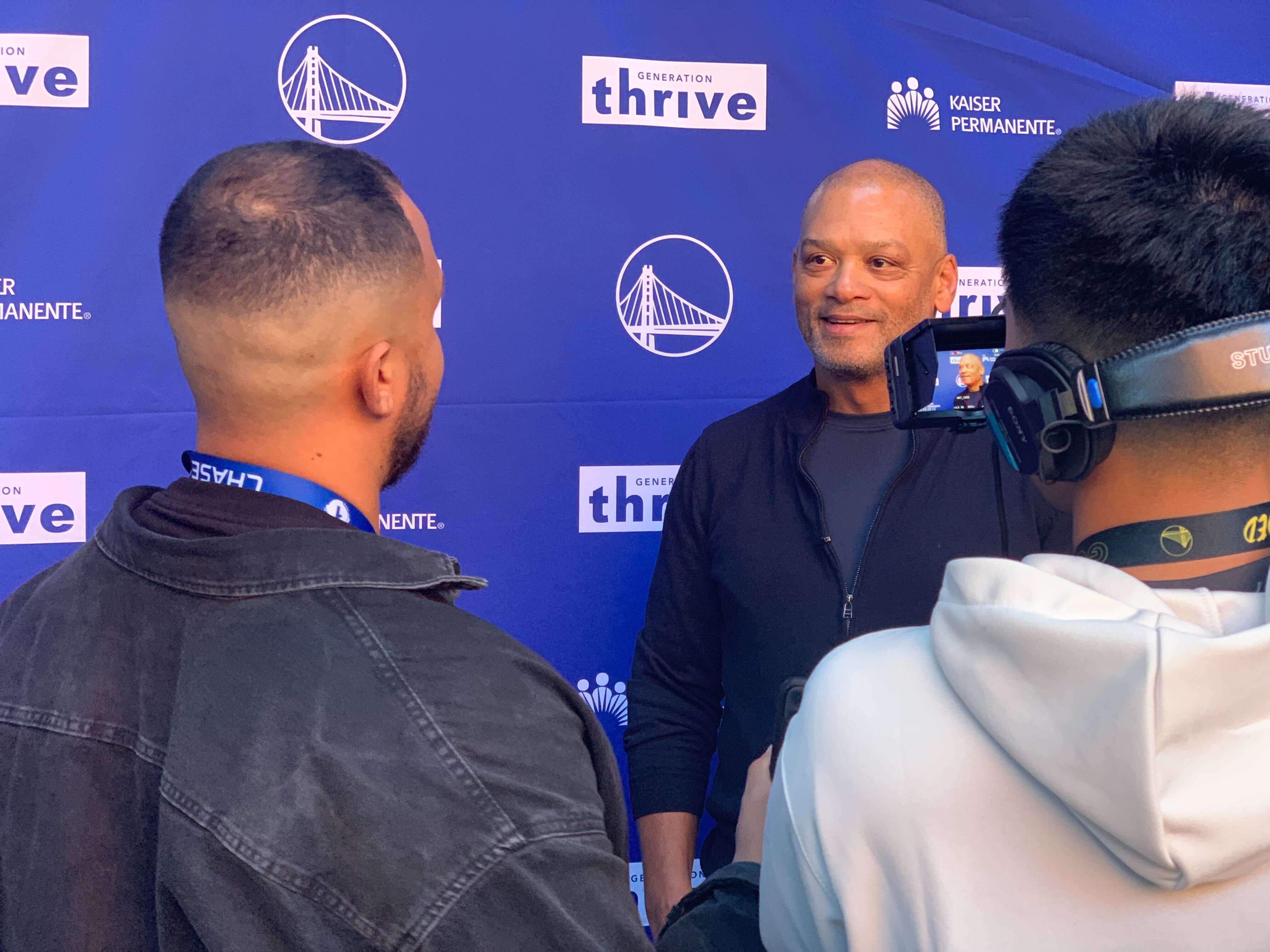 Charley Moore answering interview questions at a Generation Thrive event