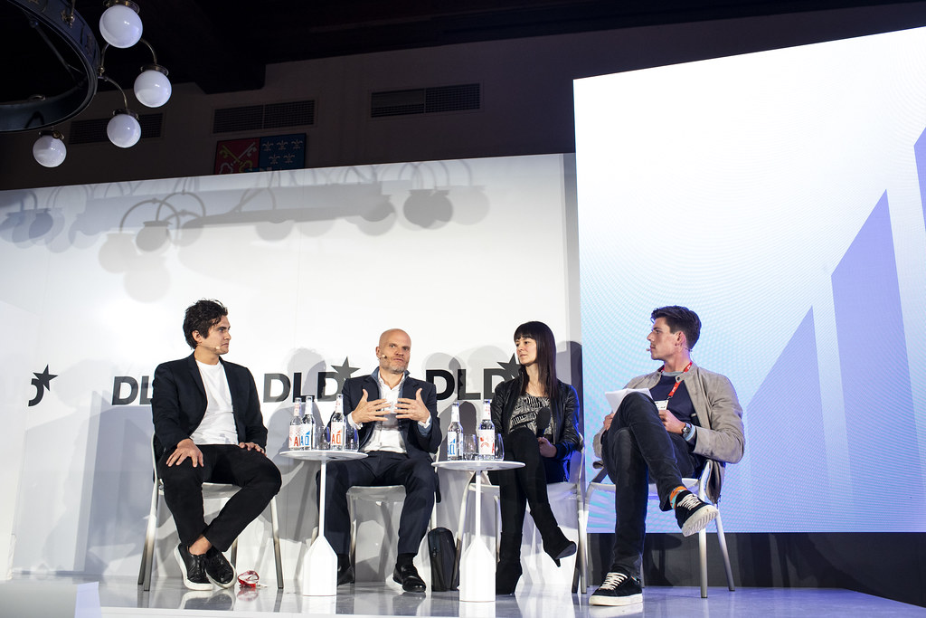 Chase Lochmiller, at left, seated with other technology executives during a panel at DLD Munich in 2020