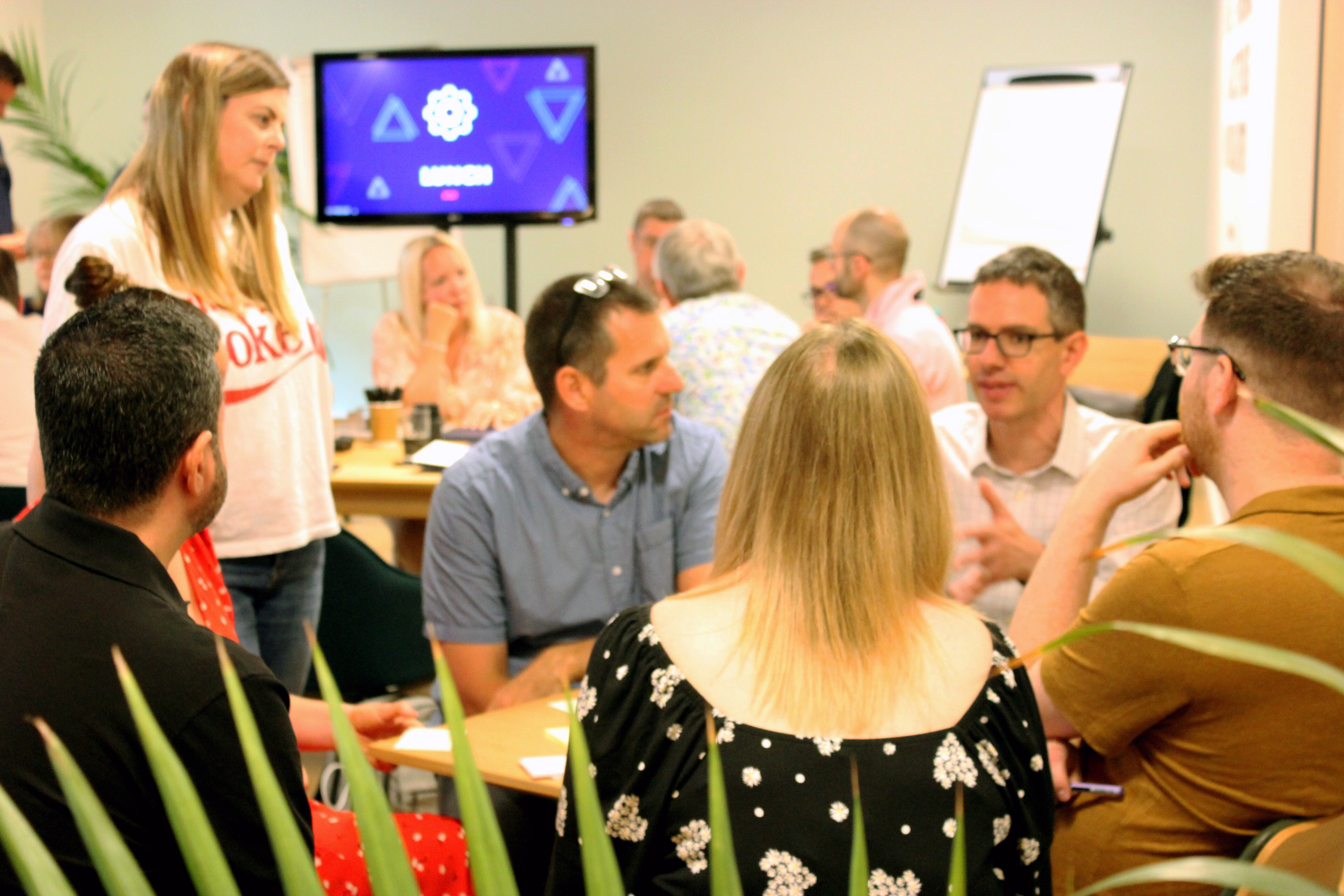 Checkit colleagues in a group discussion