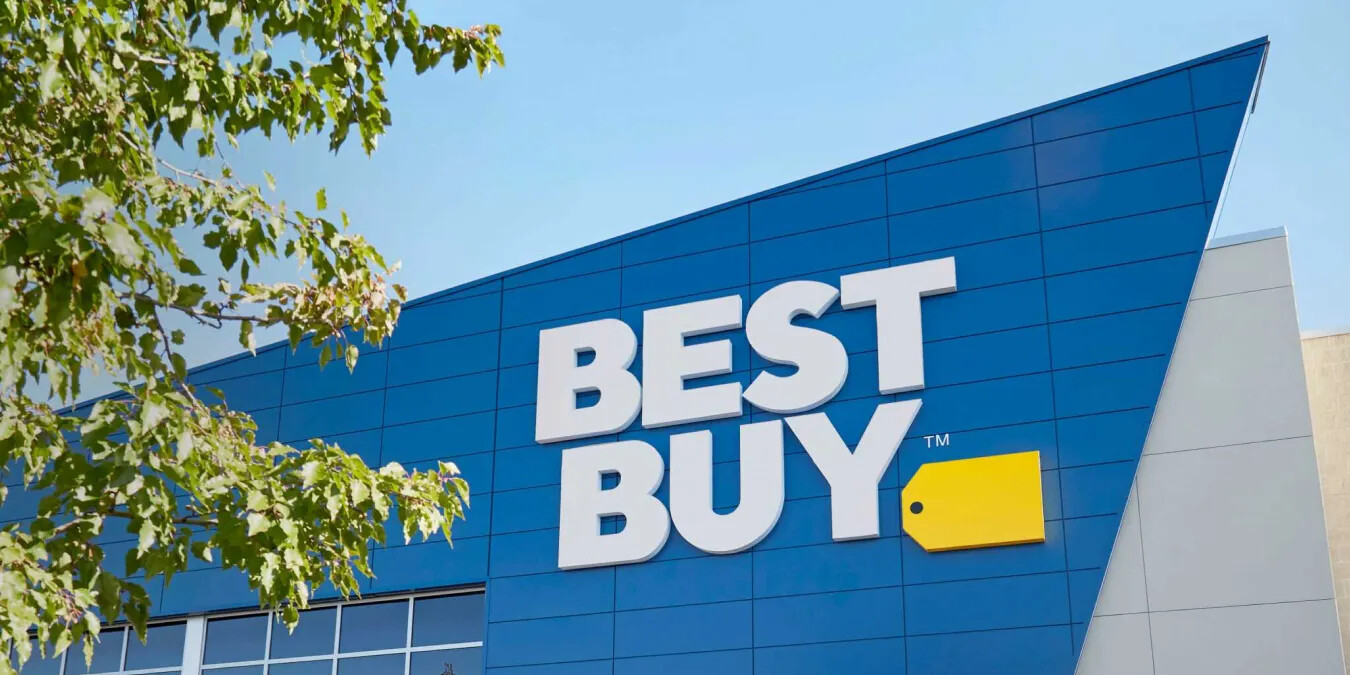 A Best Buy store exterior under a clear blue sky