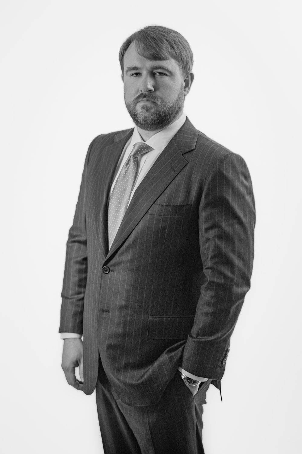 Black-and-white portrait of Checkmate founder and managing partner Ches McDowell