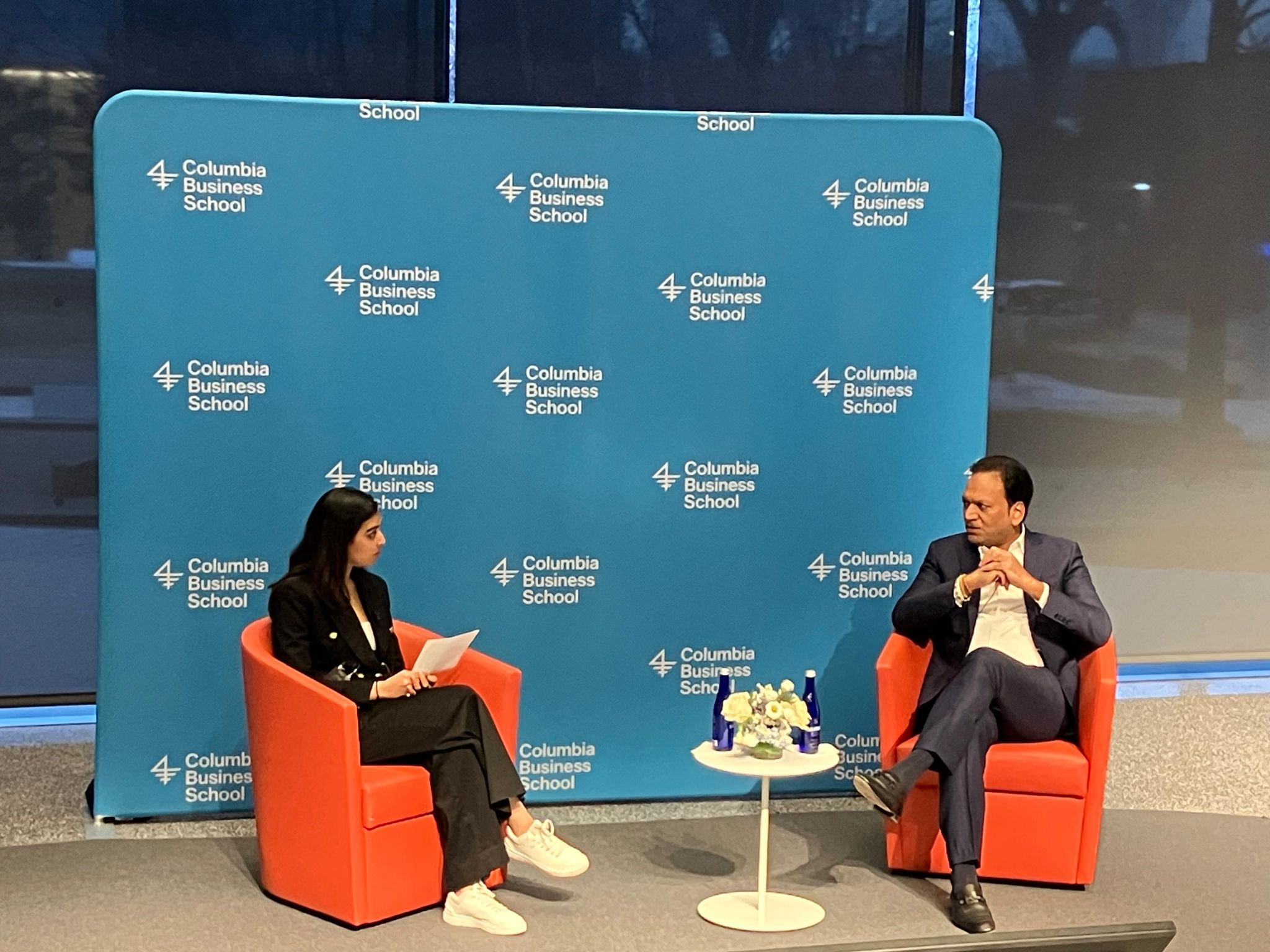 Chintu Patel seated on stage speaking during a fireside chat at Columbia University