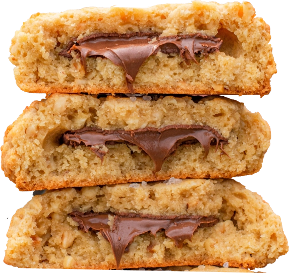 Three thick Chip City chocolate chip cookies stacked together