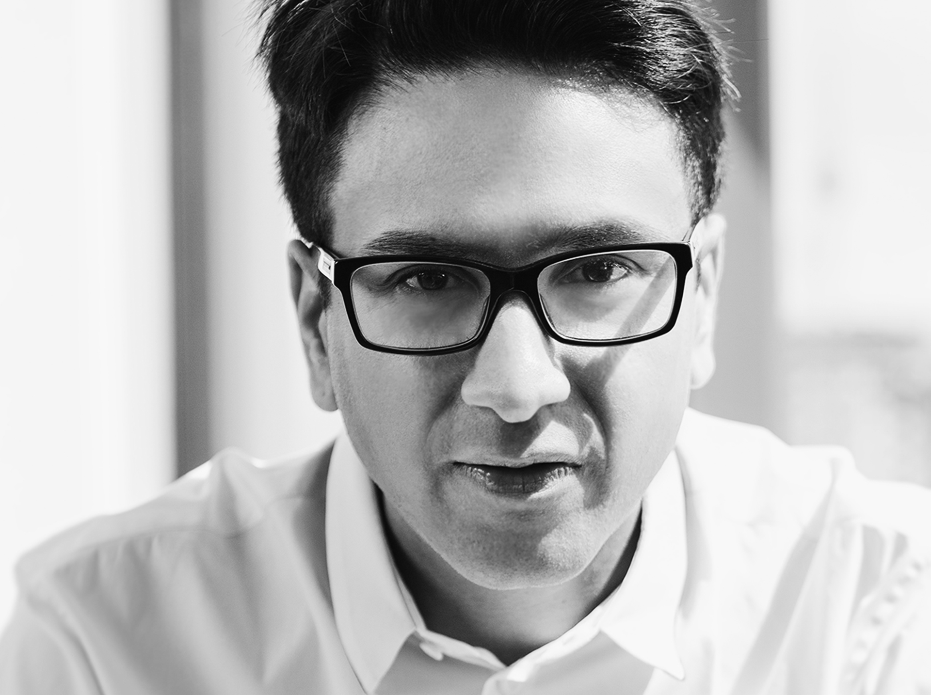 Black-and-white portrait of Choxi co-founder Deepak Agarwal