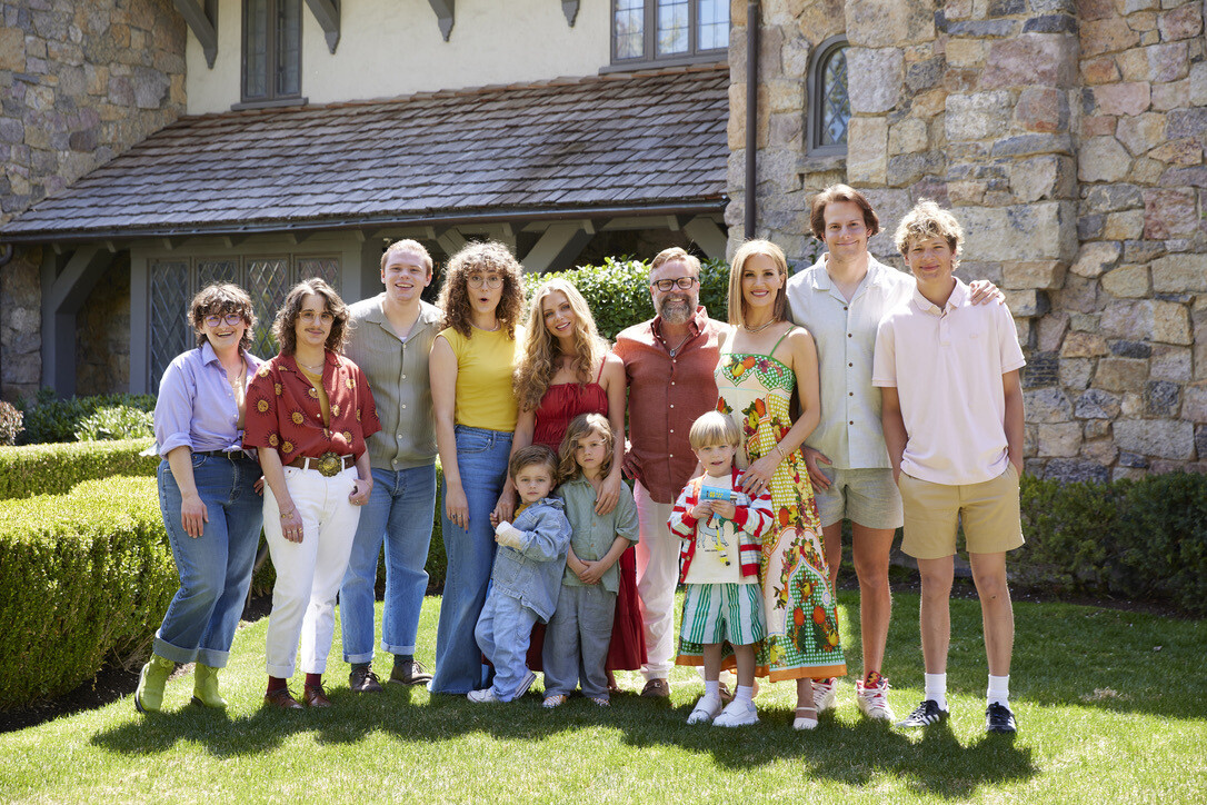 Chris Harrington and Angie Harrington standing outdoors with members of their blended family