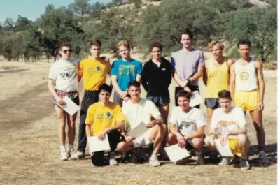 Humboldt State’s 1991 men’s cross-country team posing outdoors
