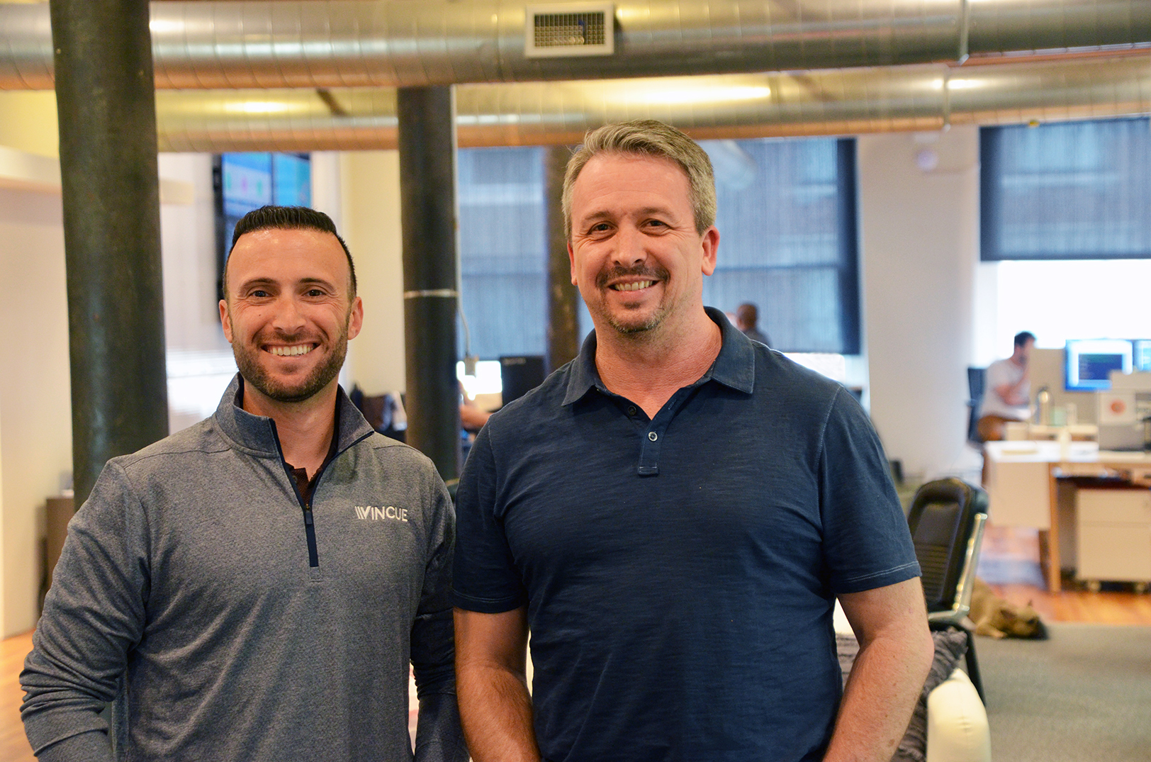 Danny Zaslavsky, left, and Chris Hoke in the VINCUE office