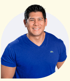 Chris Martinez smiling in a blue shirt