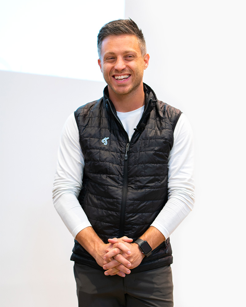 Chris Ronzio speaking in a black Trainual vest