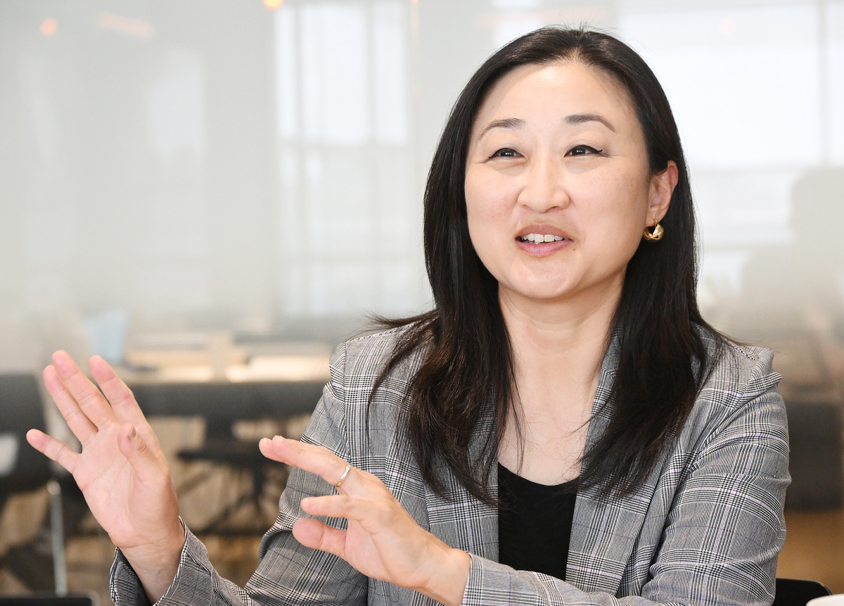 Christine Tsai speaking during an interview at COEX in Seoul