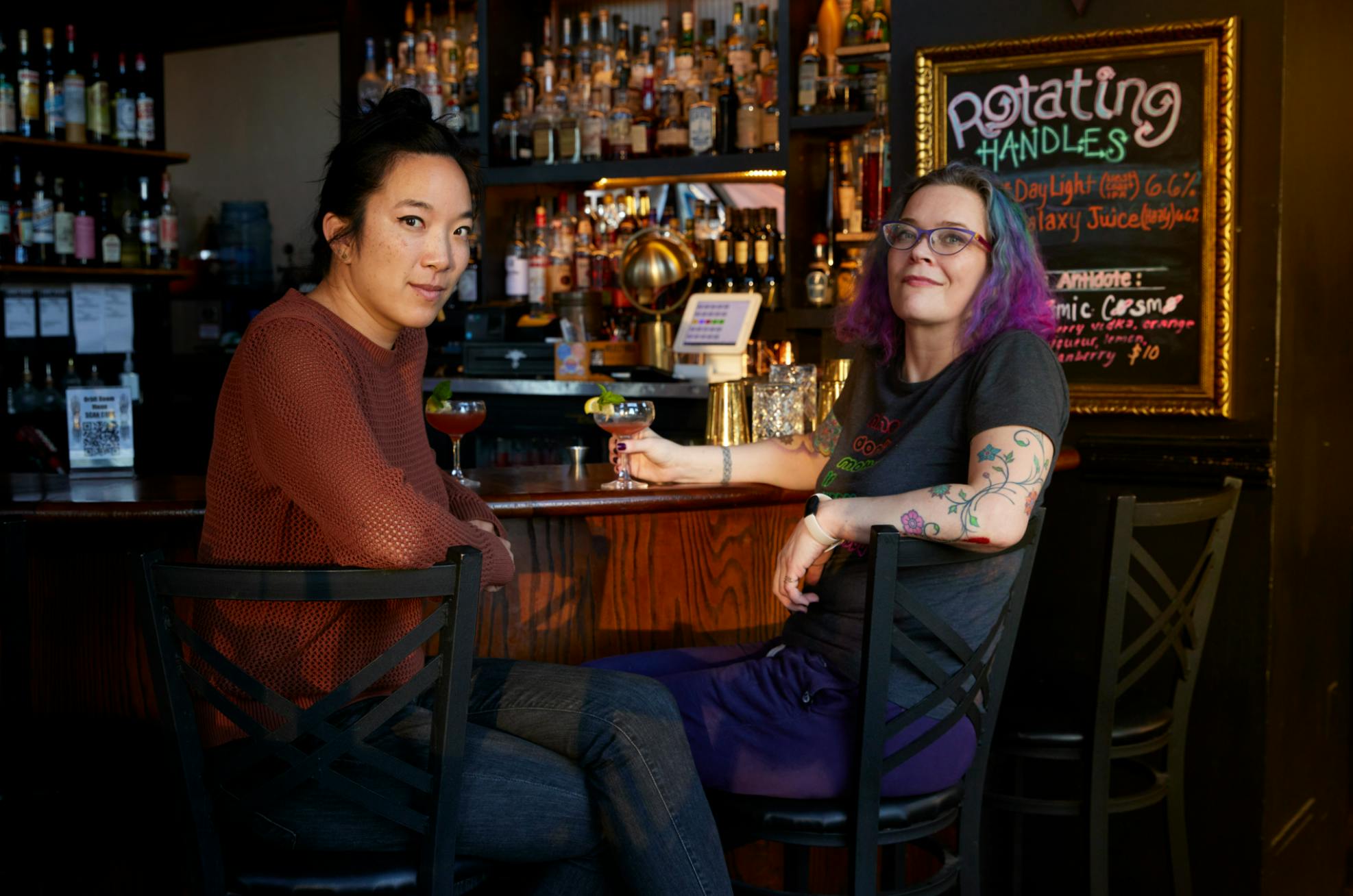 Christine Yen, left, and Charity Majors seated at the bar in San Francisco's Orbit Room