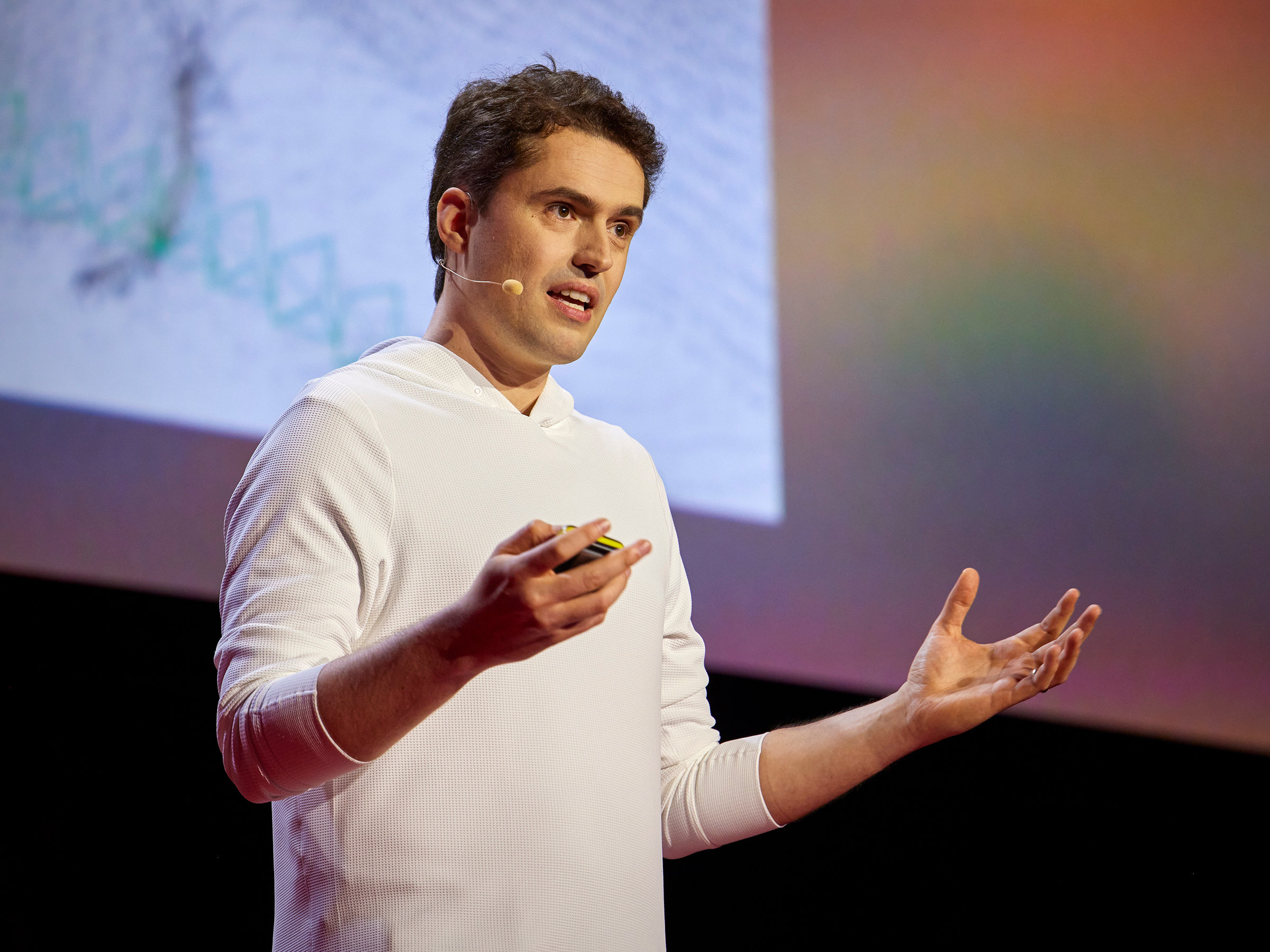 Christoph Lassner speaking onstage at TEDAI Vienna in 2025