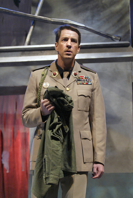 Christopher P. Austin performing on an opera stage in costume