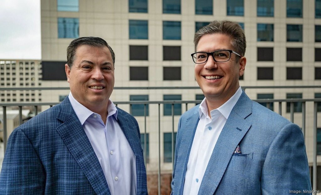NinjaOne co-founders Christopher Matarese and Sal Sferlazza standing together