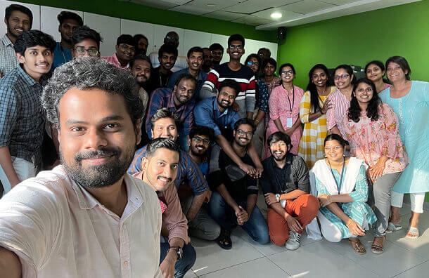 A group of Chronus colleagues gathered for a team photograph