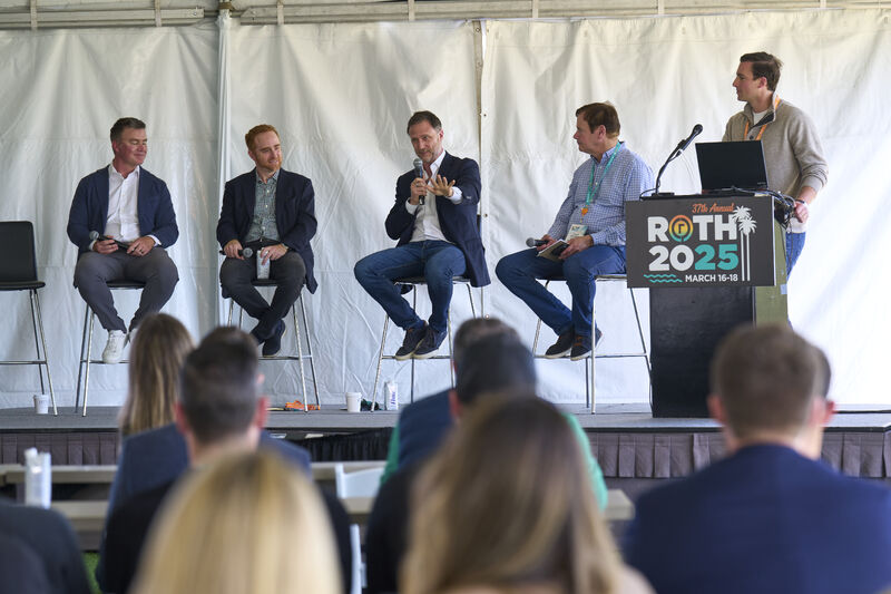 Chuck Esserman participating in a seated panel at the ROTH 2025 conference