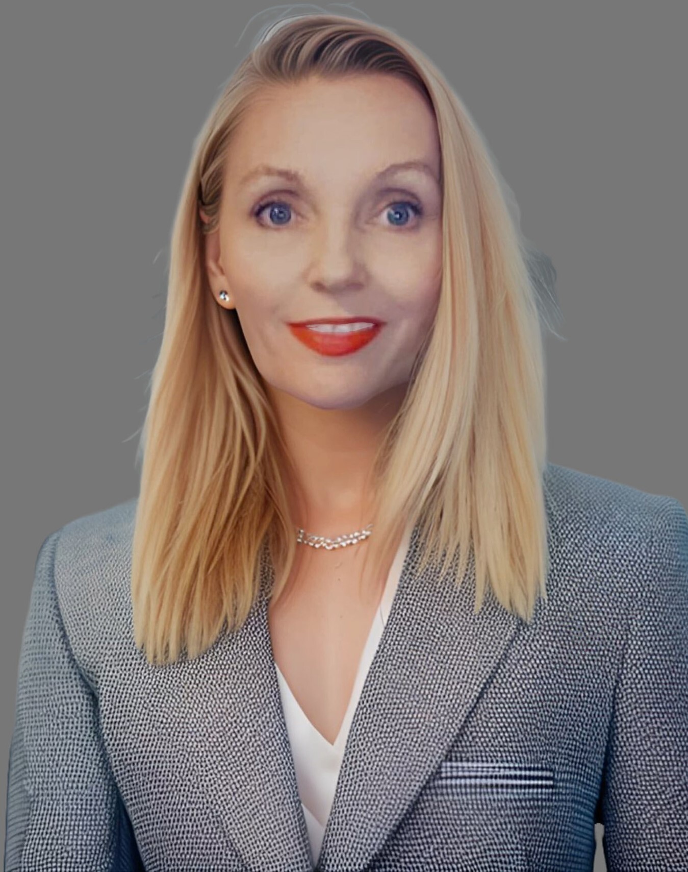 Cindy Williams in a gray checked blazer against a gray background