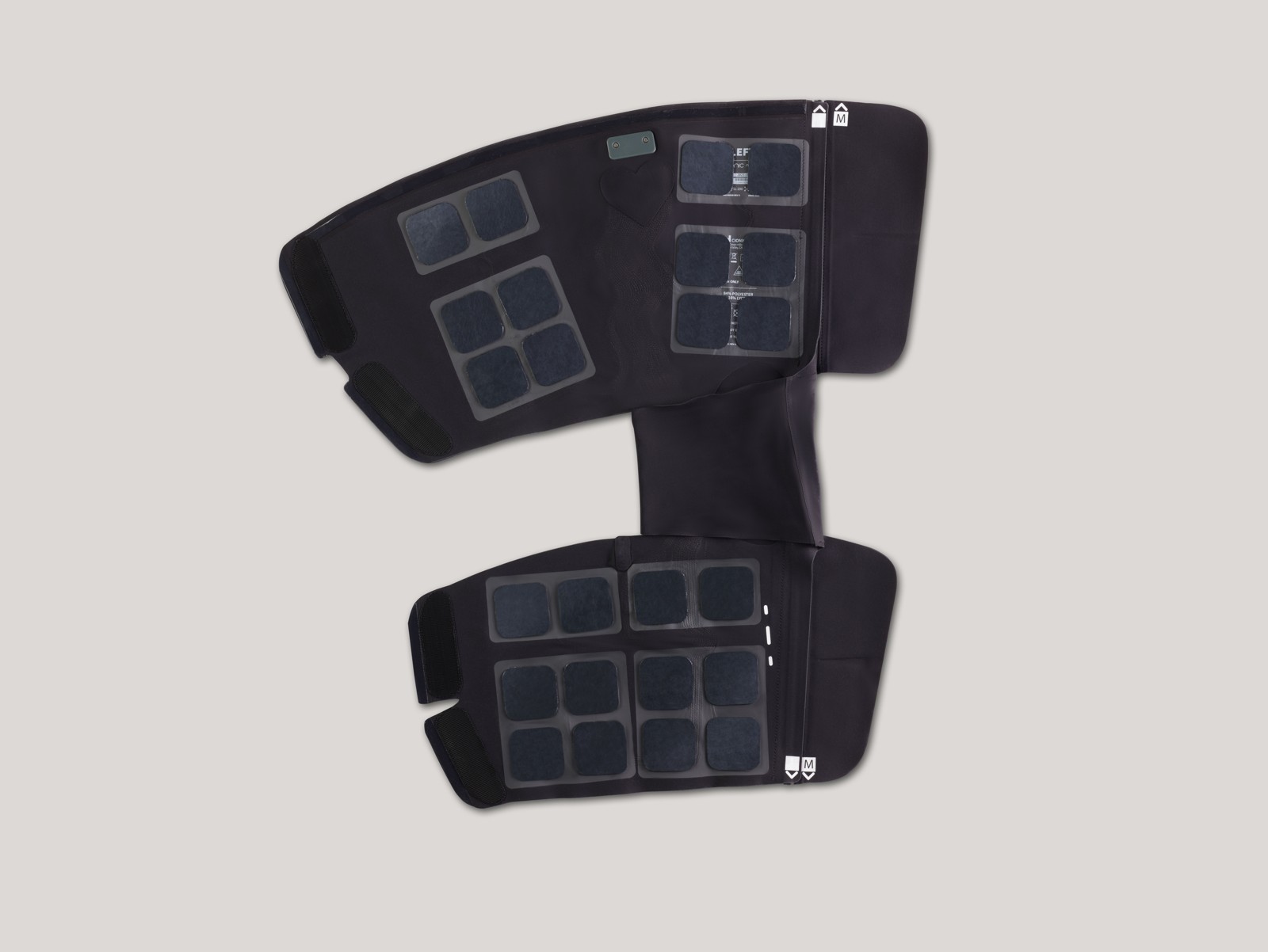 An earlier CIONIC Neural Sleeve opened flat, showing its interior electrode arrays