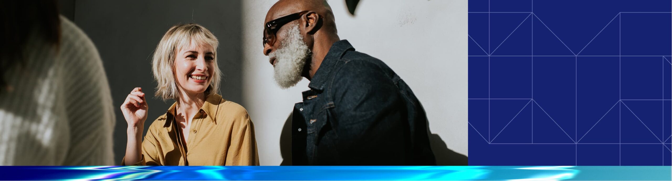 Two people in conversation in Datavant careers promotional imagery
