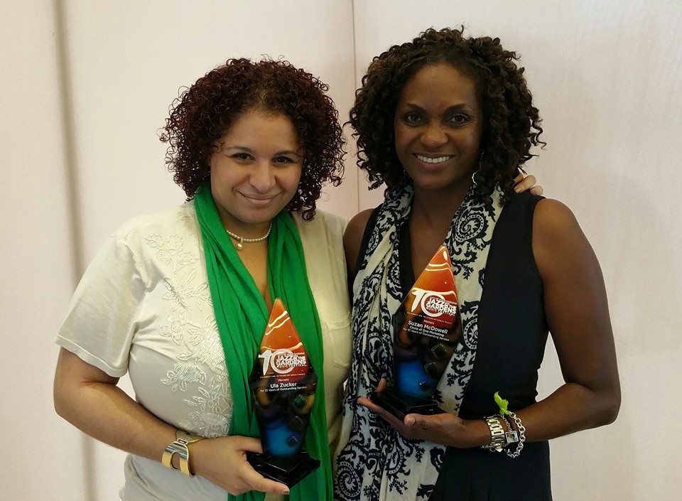 Suzan McDowell and a colleague holding Jazz in the Gardens tenth-anniversary awards