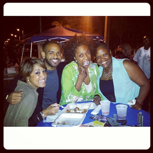 Members of the Circle of One Marketing team sharing a meal at an outdoor event