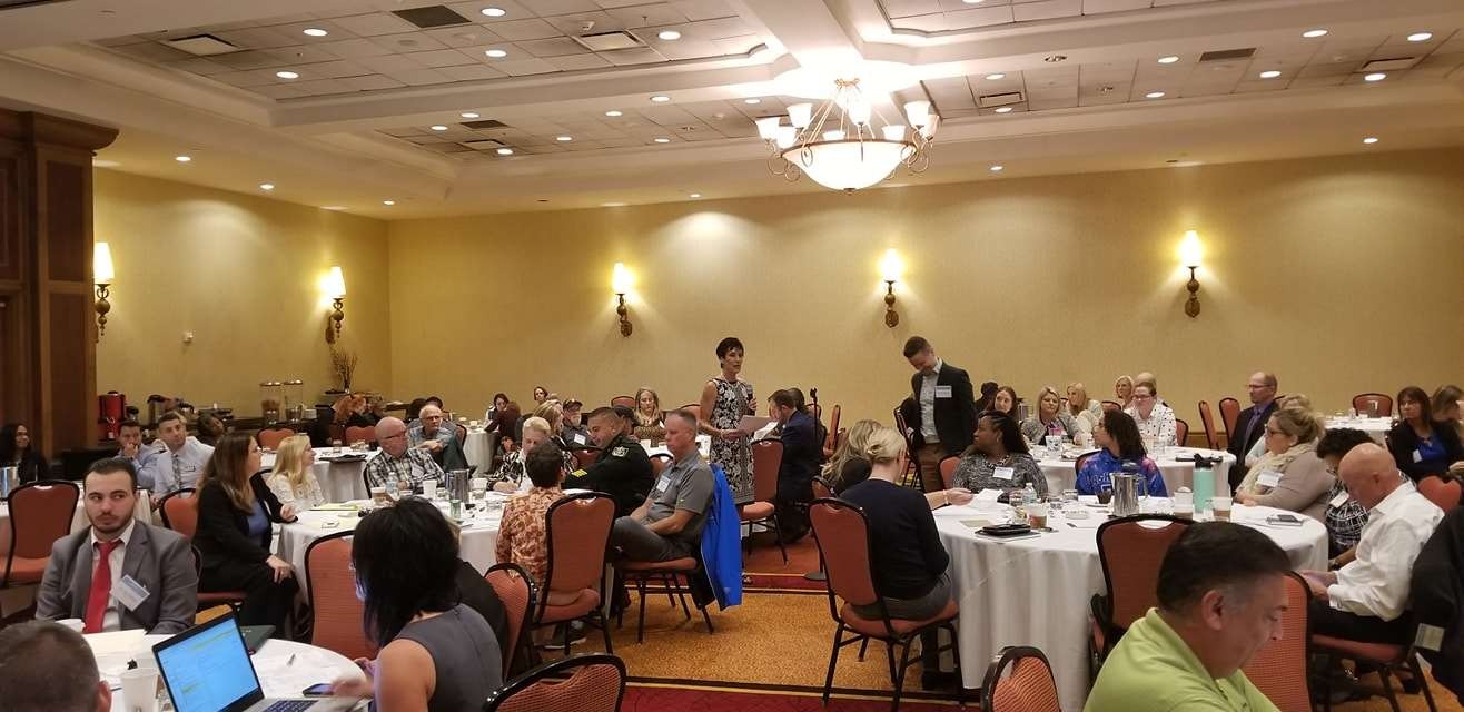 Community leaders working in small groups at the 2019 Turning the Tide youth-vaping summit in St. Augustine, Florida