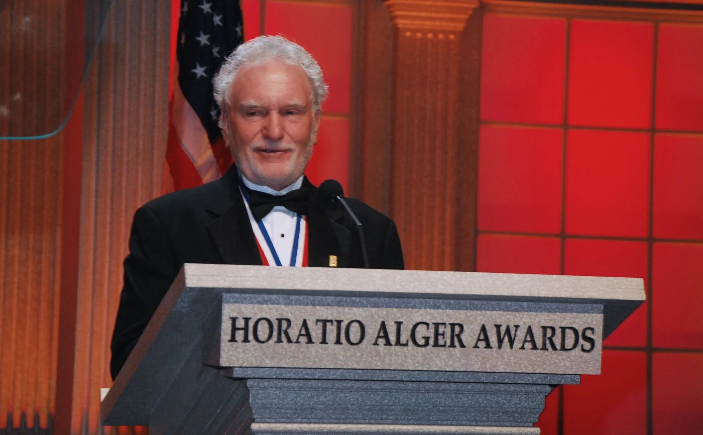CL Werner at a lectern accepting the Horatio Alger Award in 2012