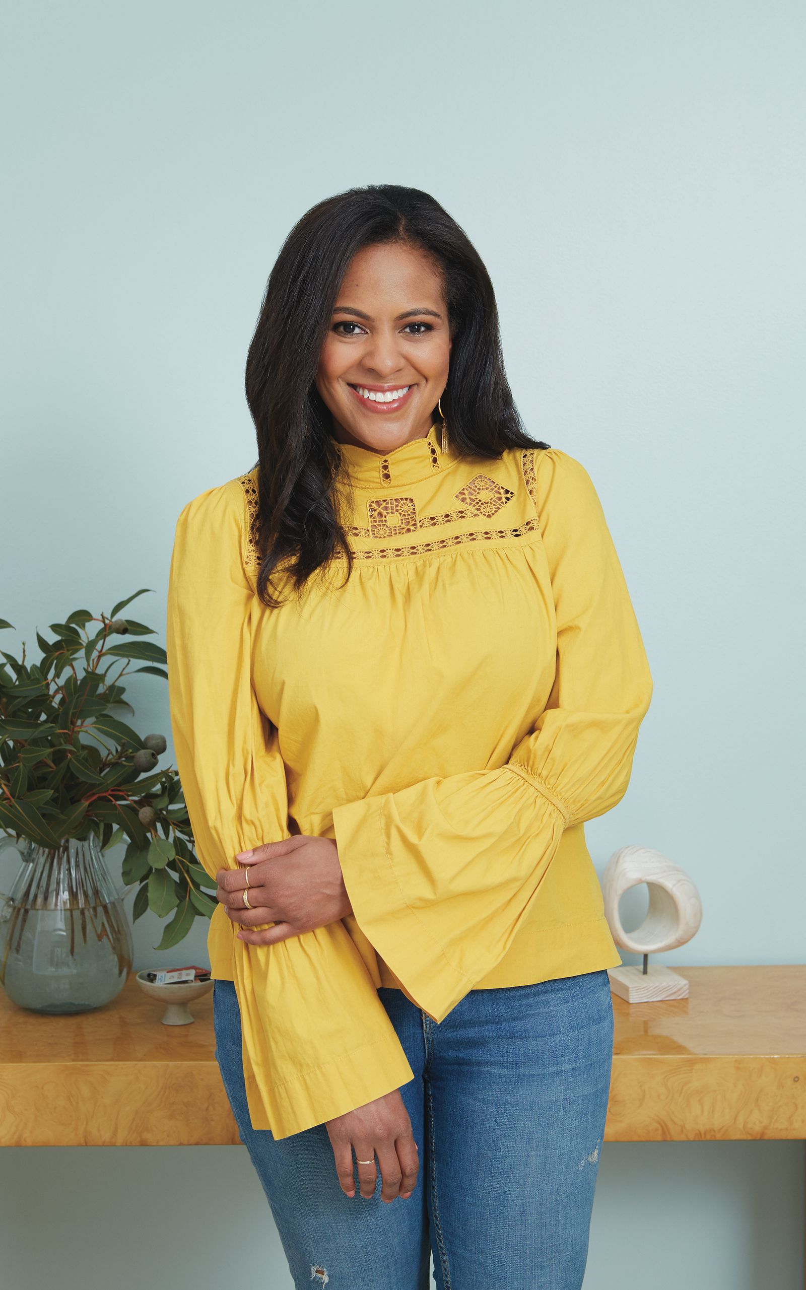 Clare founder Nicole Gibbons in a yellow blouse