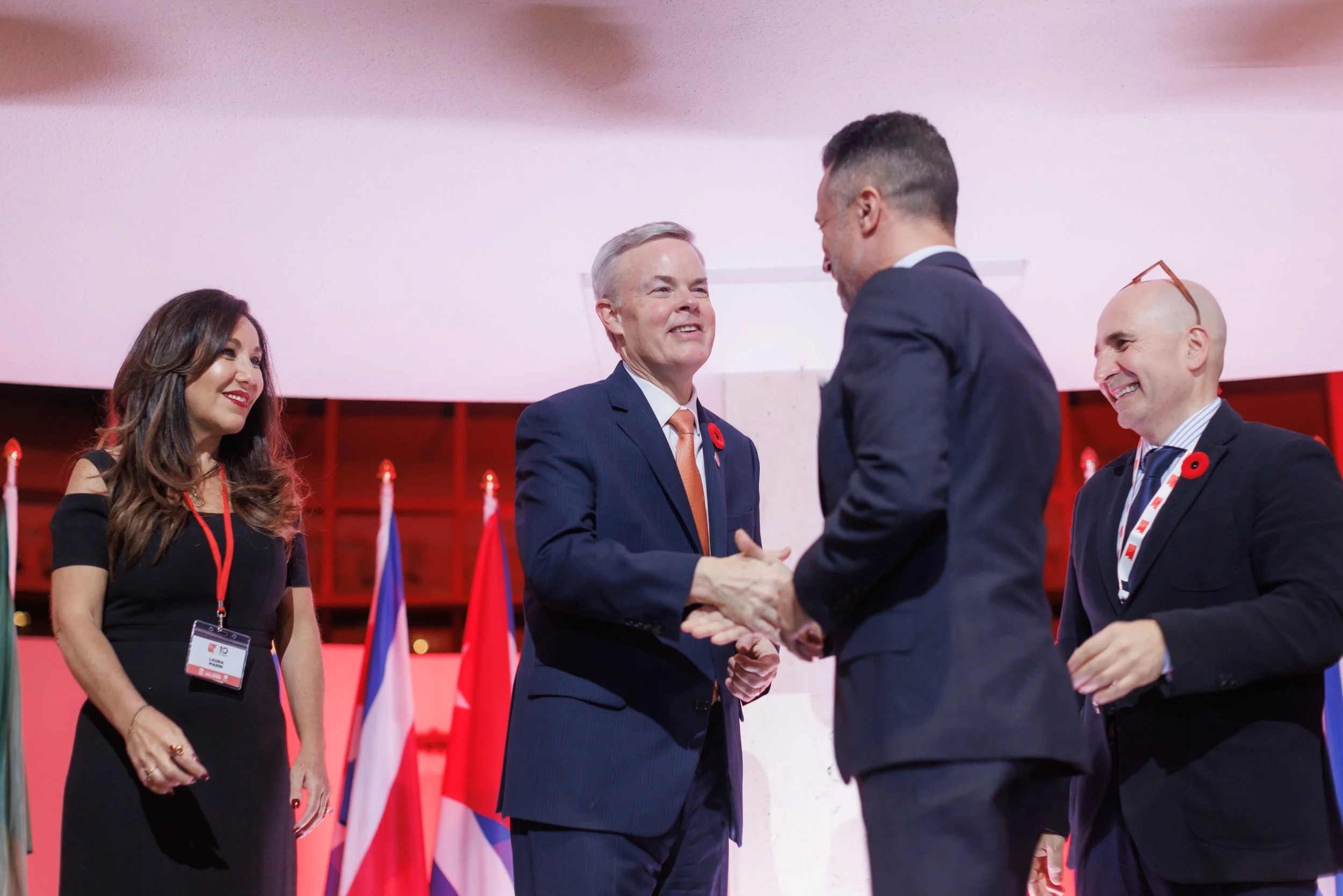 U.S. Consul General Baxter Hunt shaking hands with Claudio Rojas at the TLN award presentation