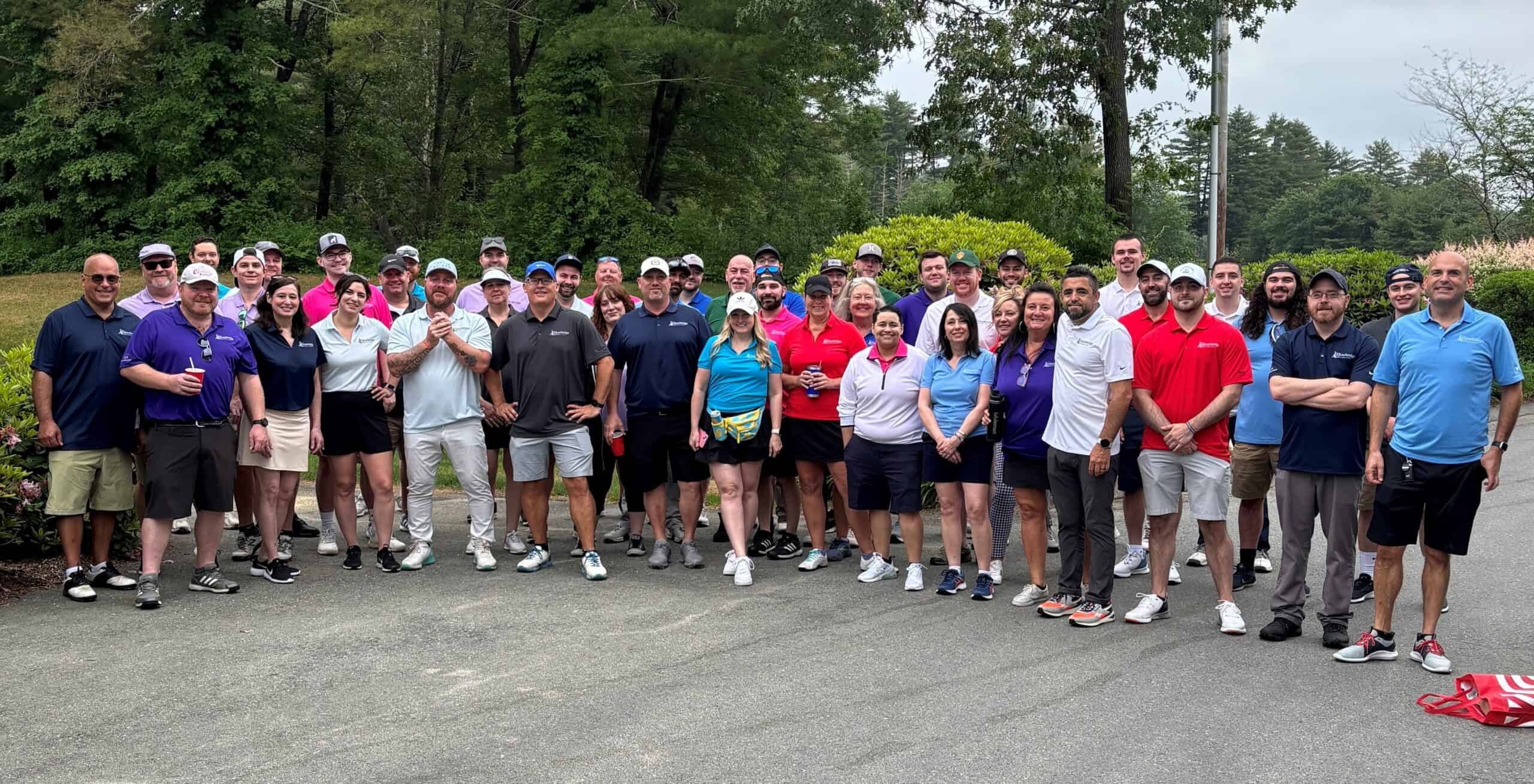 ClearBridge team members gathered outdoors at the company’s 2024 golf outing