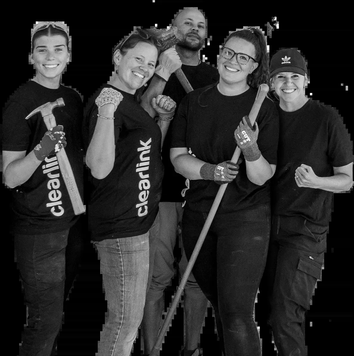 Five Clearlink volunteers holding tools during a community service activity
