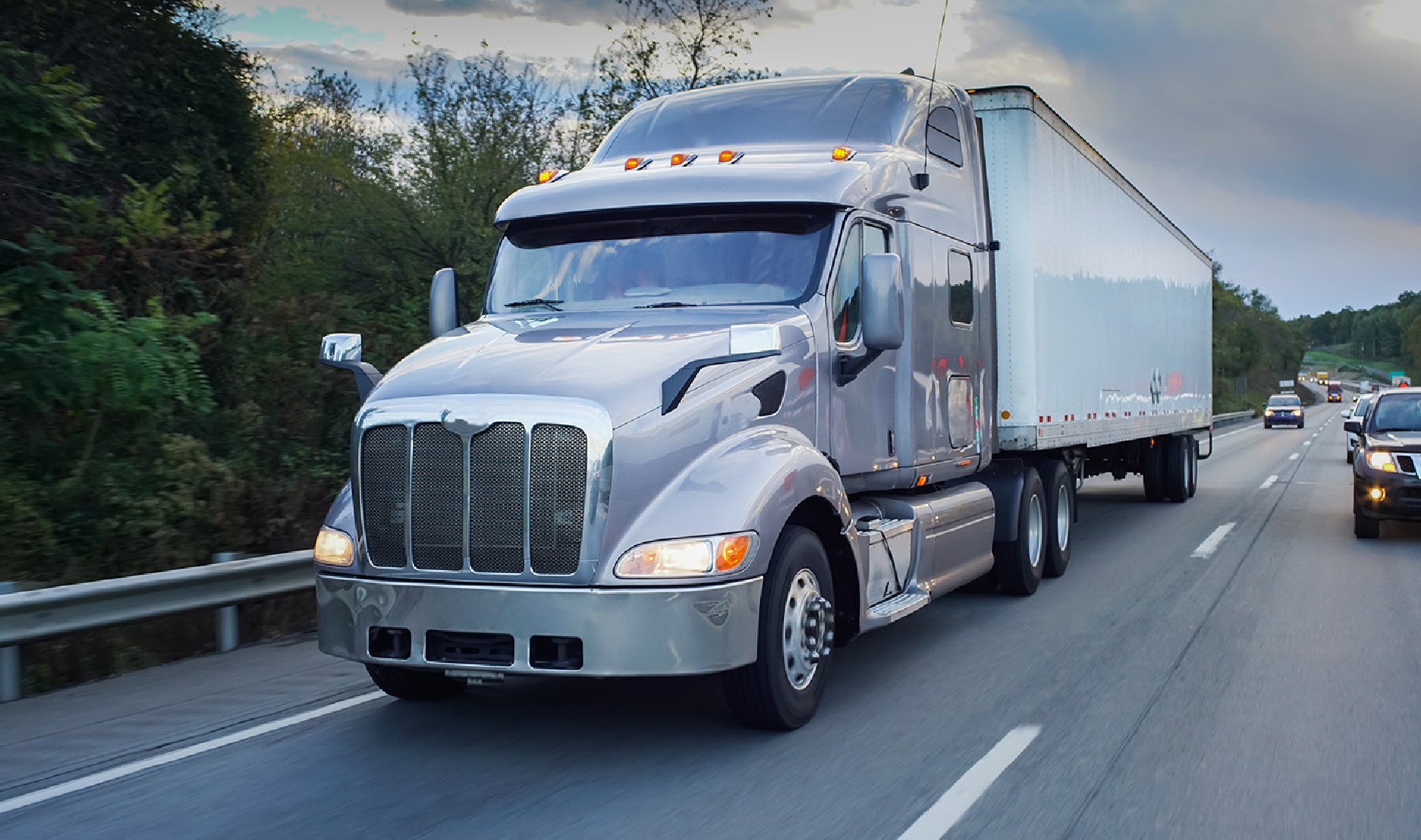 A tractor-trailer traveling on a highway, from Cleo’s Giltner case study