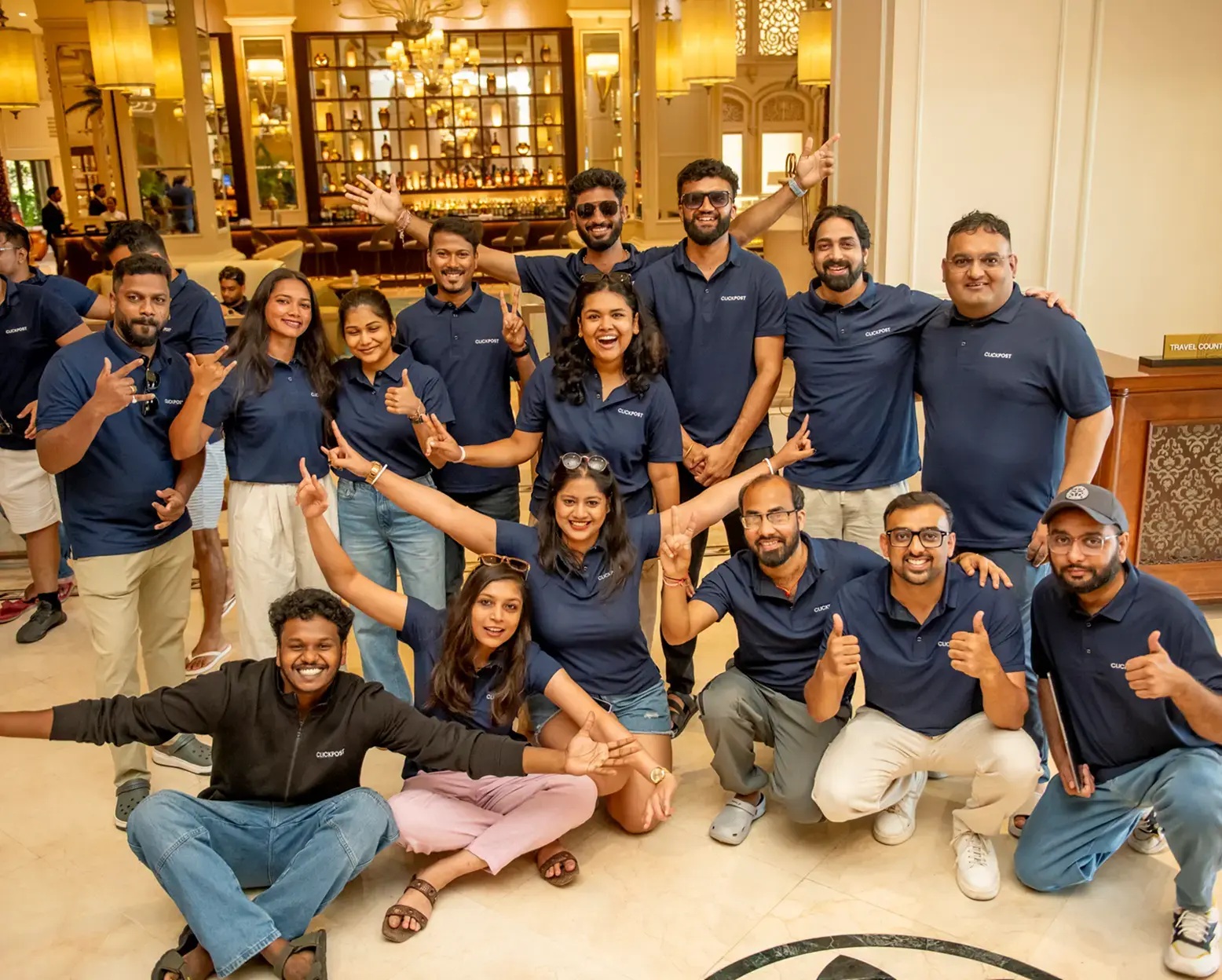 ClickPost team members posing together at a company gathering
